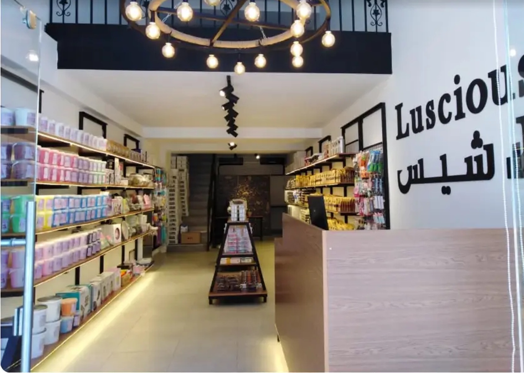 Inside the Luscious shop in Tyre — shelves stocked with chocolate, fillings and baking supplies